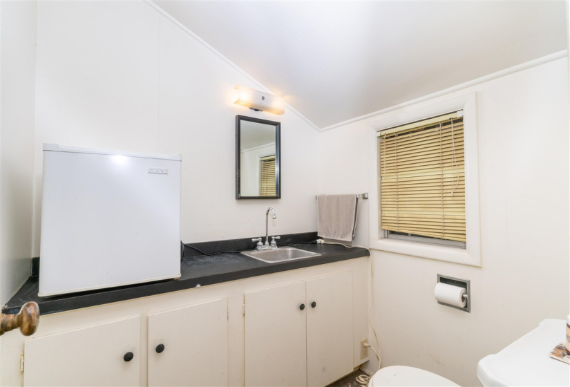 Half bath located in garage